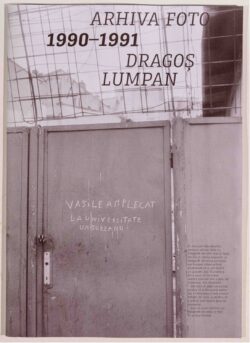black and white image of a solid metal gate. See caption for details.